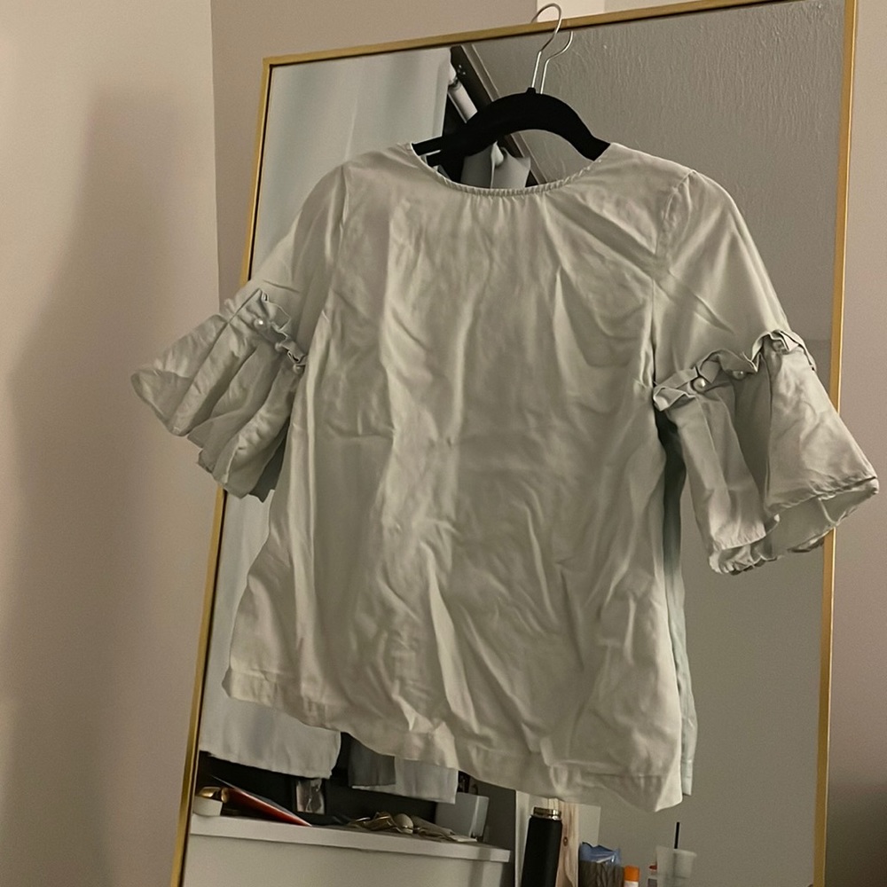 Ligh blue shirt from 1250 C size small